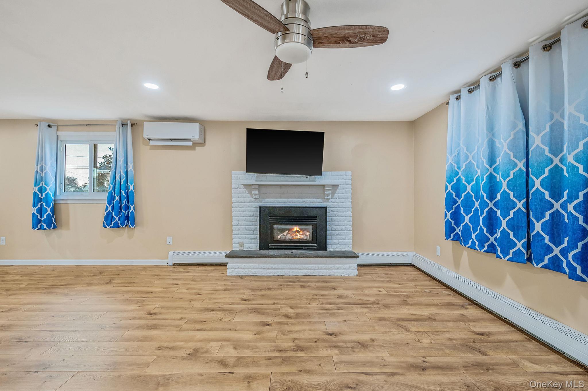 6 Rugby Drive West Shirley, NY 11967 - Photo 19 of 35 FireplaceLarge bay window