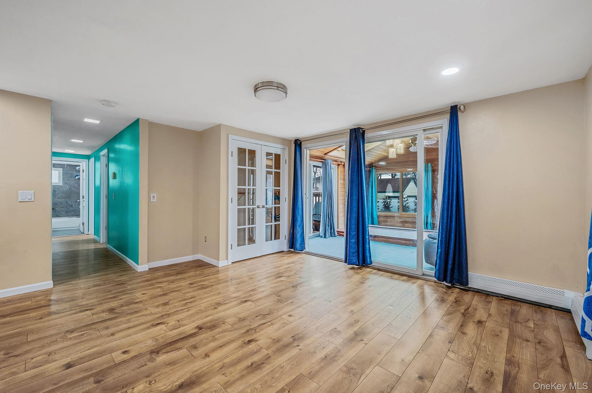 6 Rugby Drive West Shirley, NY 11967 - Photo 20 of 35 French closet door 3rd wall area