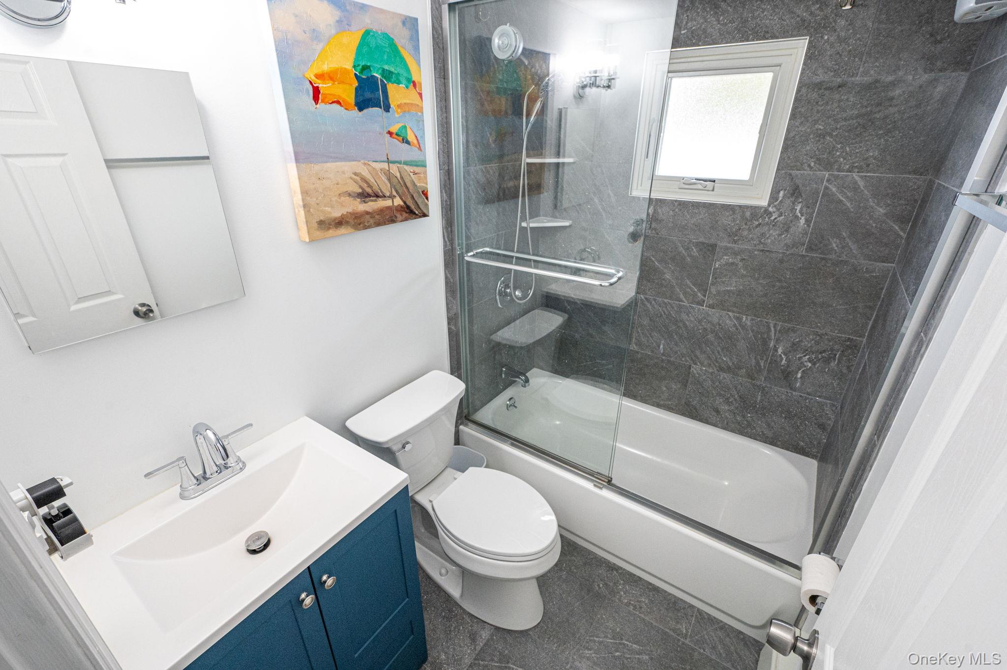 6 Rugby Drive West Shirley, NY 11967 - Photo 28 of 35 Fully Remodel - 2024Tub with glass doorAnderson window