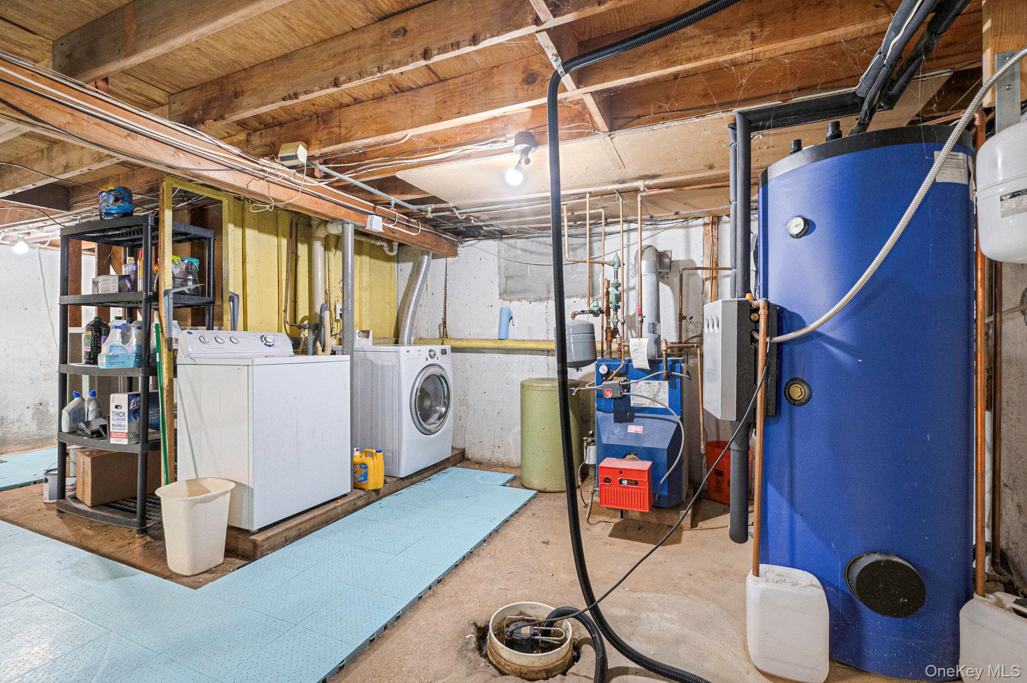 6 Rugby Drive West Shirley, NY 11967 - Photo 32 of 35 Overhead light aboveWasher & DryerSolar & oil hot water tank