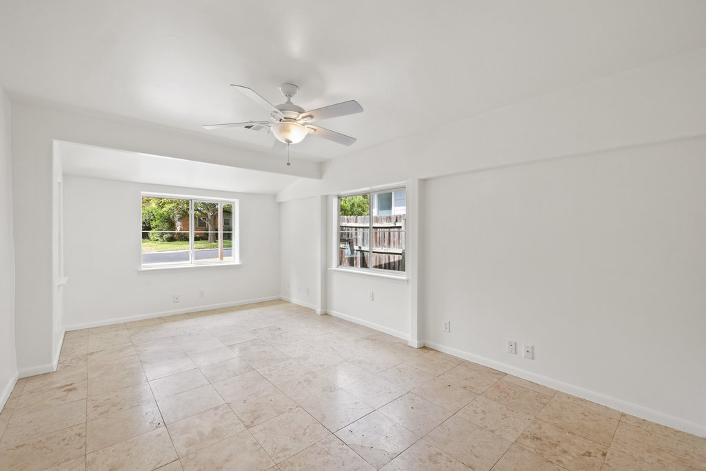 1502 Ridgehaven Drive Austin, TX 78723 - Photo 16 of 34 a view of an empty room with a window