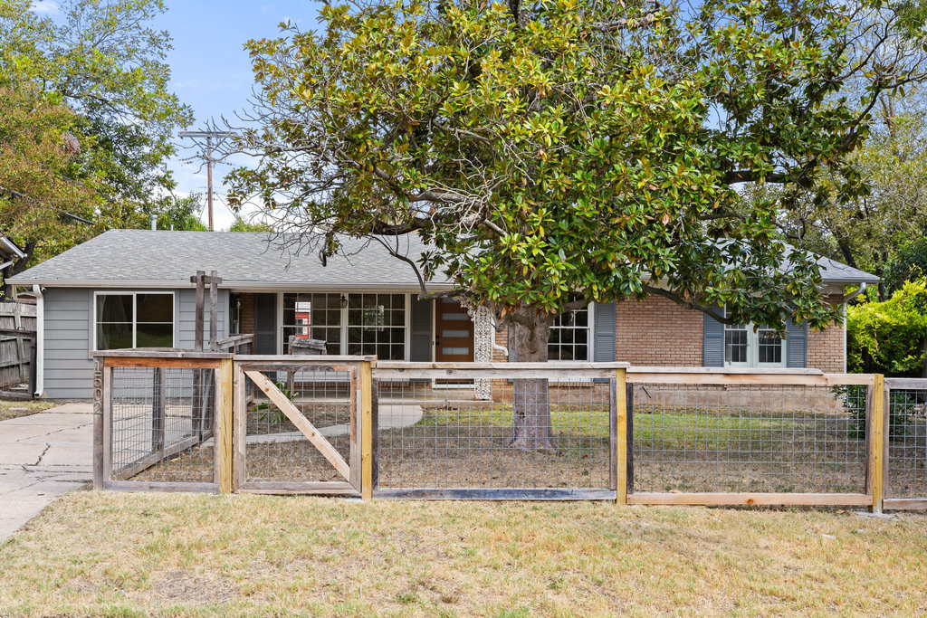 1502 Ridgehaven Drive Austin, TX 78723 - Photo 23 of 34 front view of a house with a yard