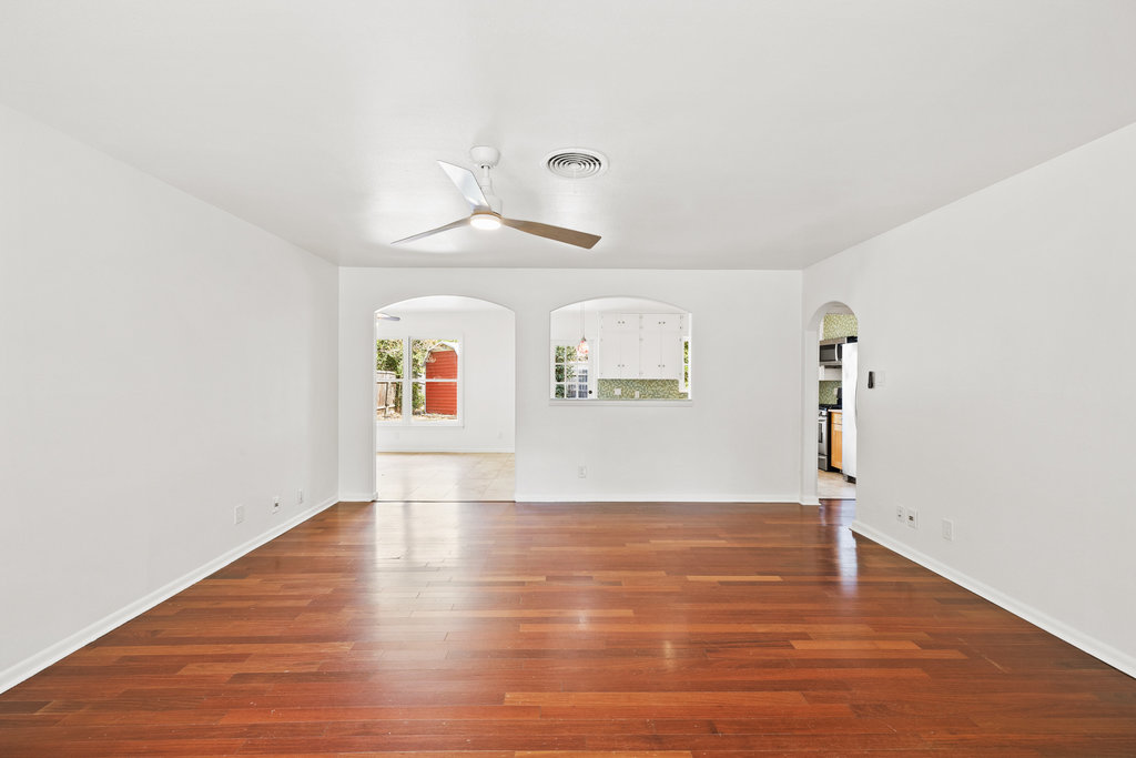 1502 Ridgehaven Drive Austin, TX 78723 - Photo 7 of 34 a view of empty room with wooden floor