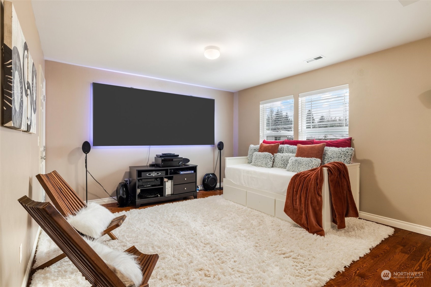3500 154th Place Southeast Bothell, WA 98012 - Photo 21 of 36 a living room with furniture and a flat screen tv