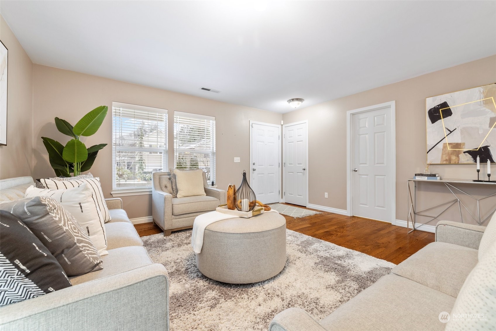 3500 154th Place Southeast Bothell, WA 98012 - Photo 6 of 36 a living room with furniture and a potted plant