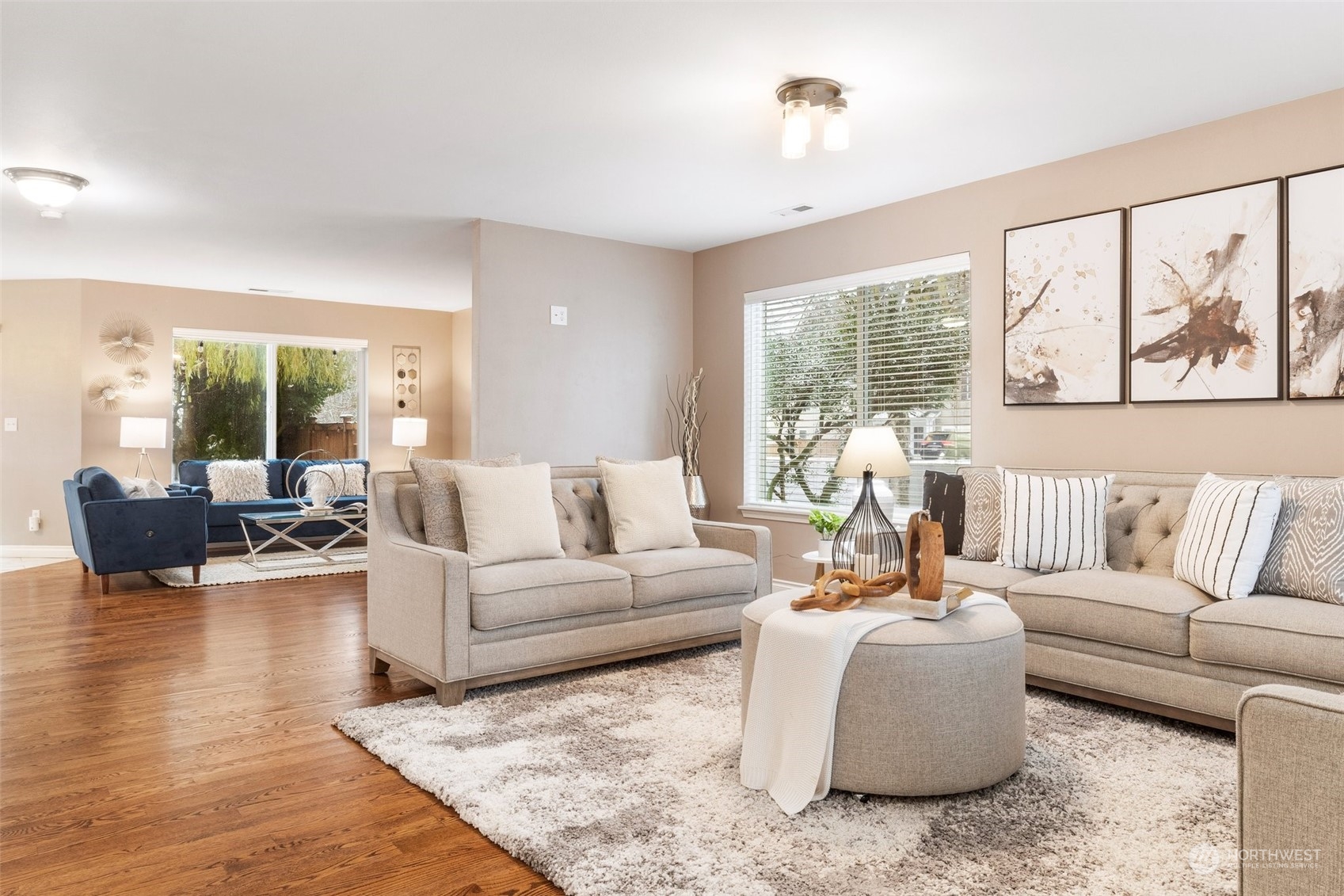 3500 154th Place Southeast Bothell, WA 98012 - Photo 8 of 36 a living room with furniture large window and a wooden floor