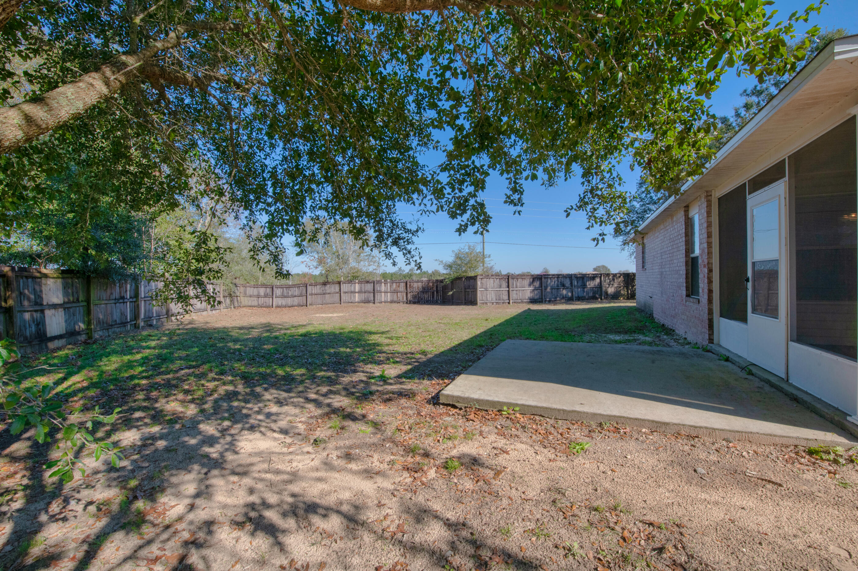 110 Sandstone Trail Crestview, FL 32539 - Photo 22 of 25 a view of backyard with green space