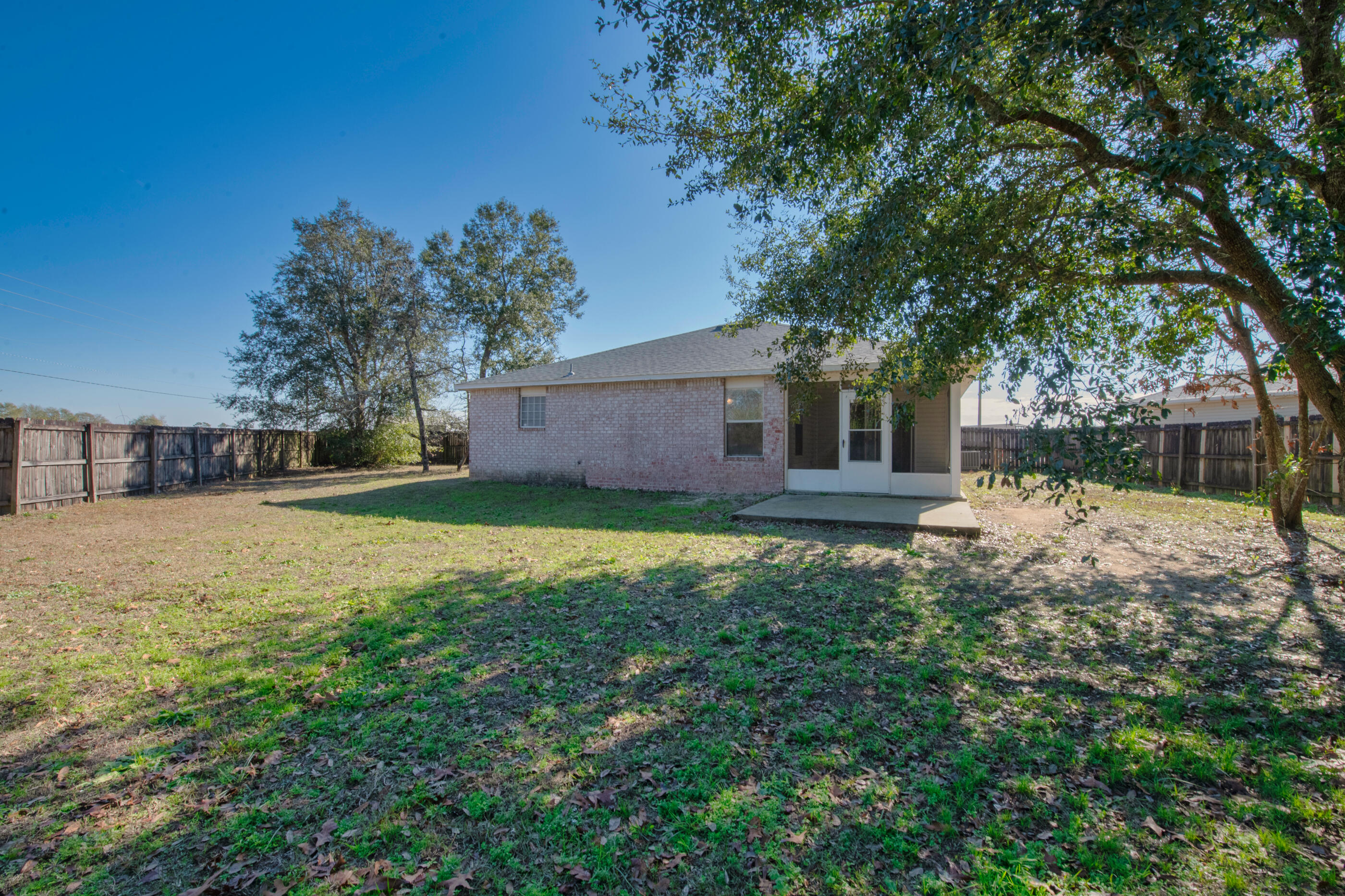 110 Sandstone Trail Crestview, FL 32539 - Photo 24 of 25 a view of a house with a yard