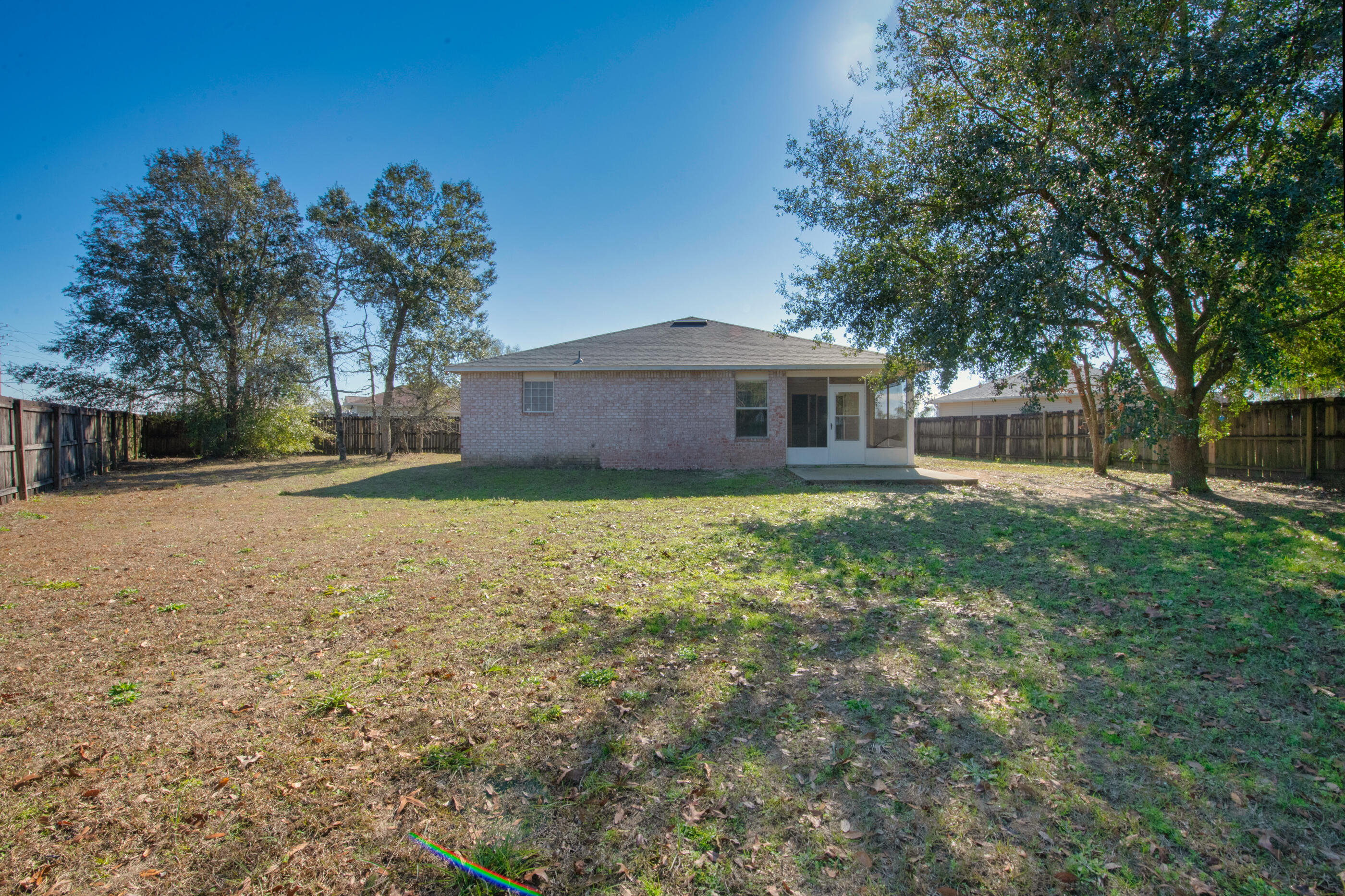 110 Sandstone Trail Crestview, FL 32539 - Photo 25 of 25 a view of a house with a yard