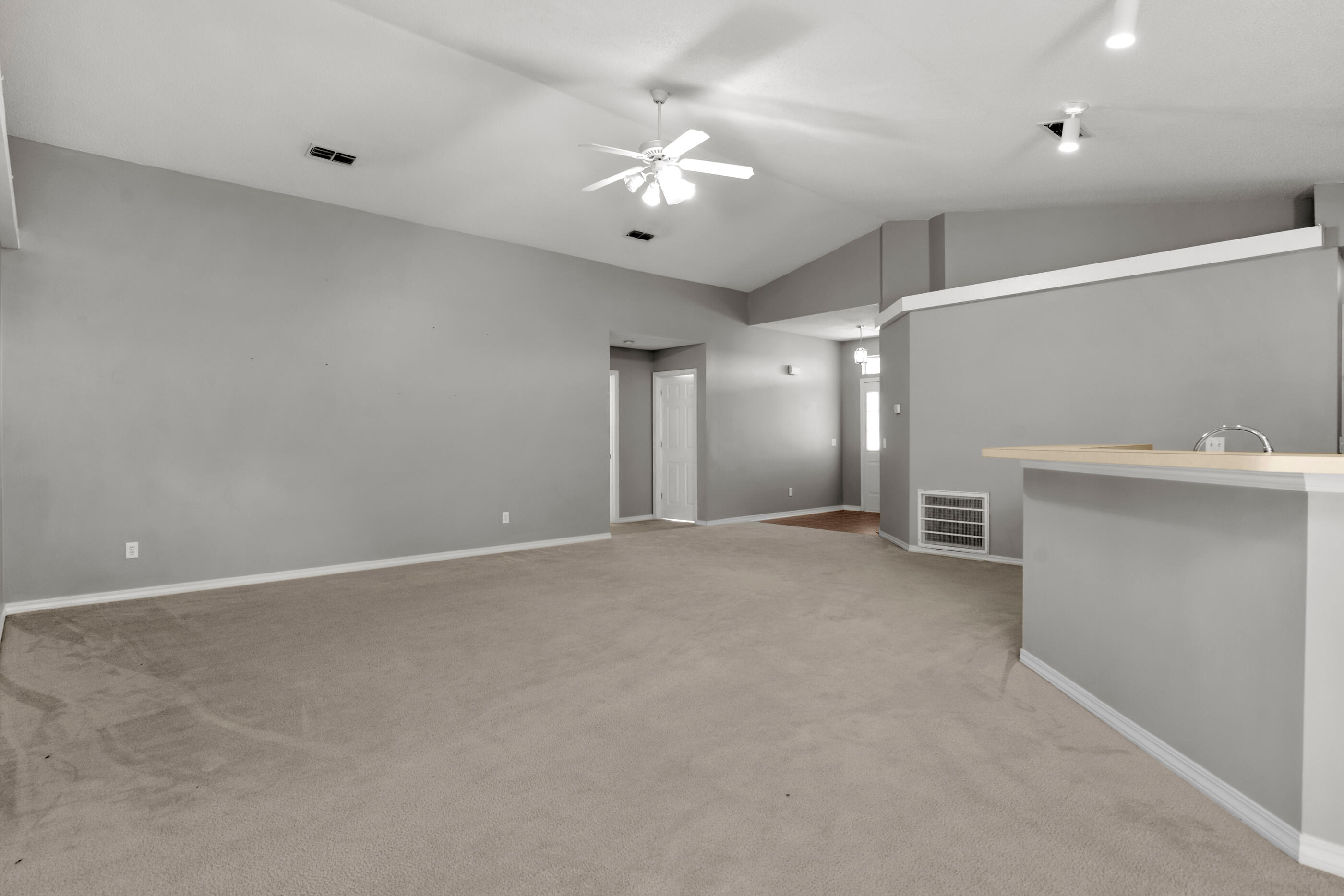 110 Sandstone Trail Crestview, FL 32539 - Photo 3 of 25 a view of a livingroom with a ceiling fan and a chandelier