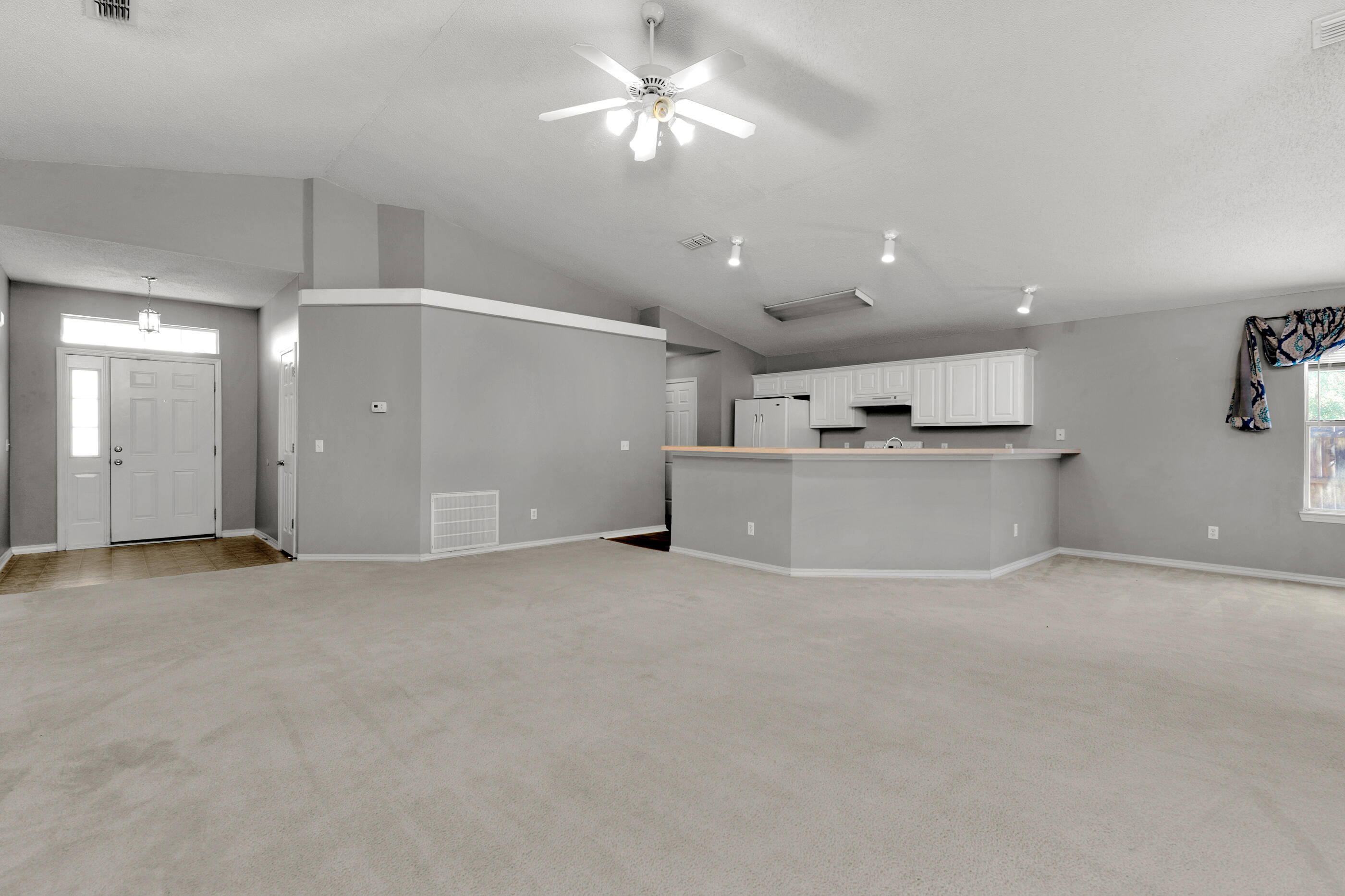 110 Sandstone Trail Crestview, FL 32539 - Photo 6 of 25 a view of a kitchen with a sink and cabinet area