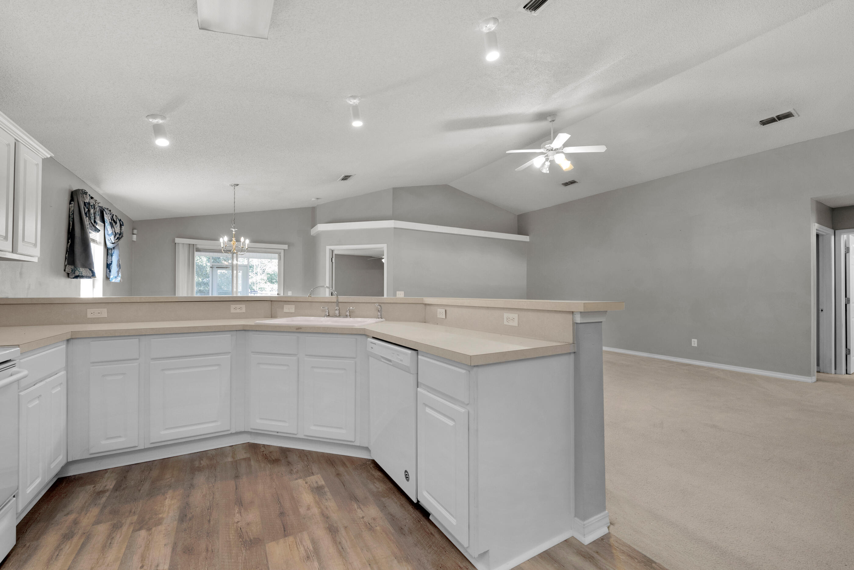 110 Sandstone Trail Crestview, FL 32539 - Photo 9 of 25 a kitchen with cabinets and window