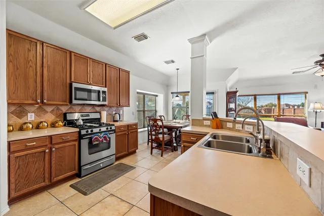 a large kitchen with lots of counter top space