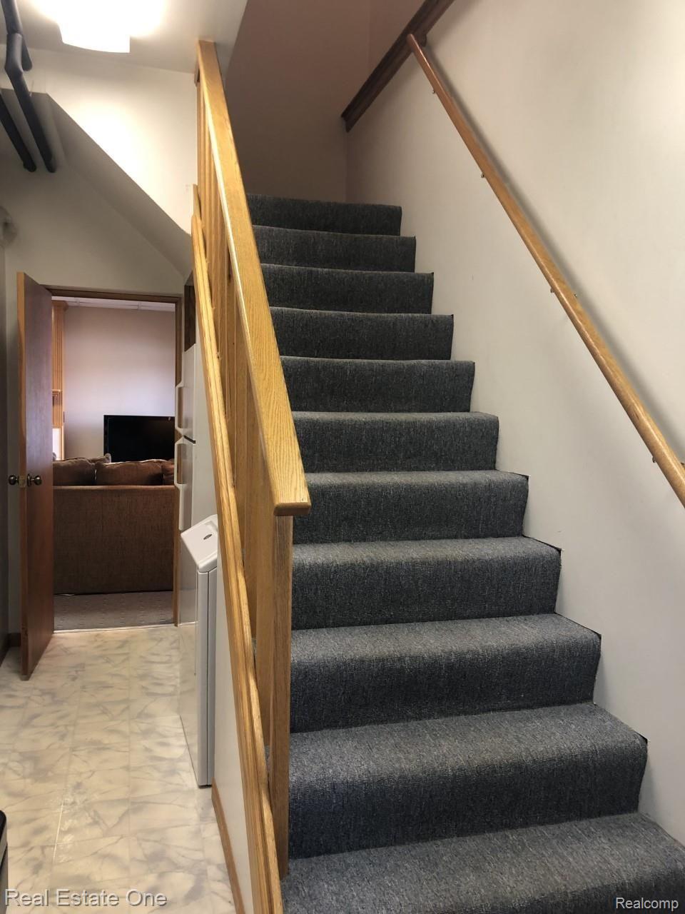 944 Pine Tree Road West Lake Orion, MI 48362 - Photo 37 of 81 Staircase from 2nd floor to 1st Floor area