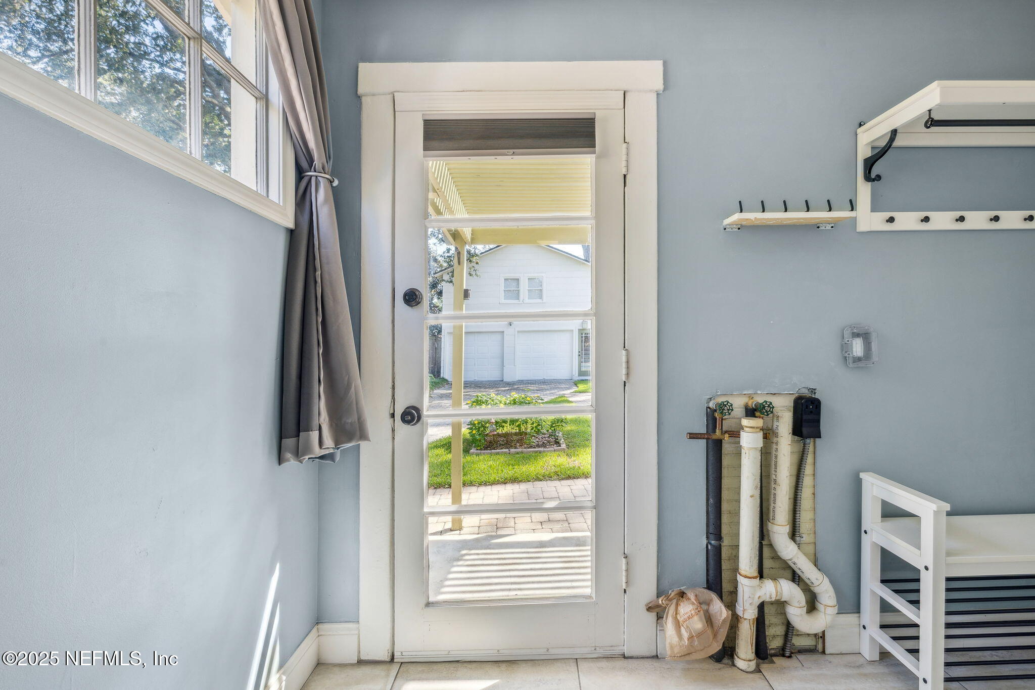 1361 Challen Avenue Jacksonville, FL 32205 - Photo 15 of 45 a view of an entryway with a small yard