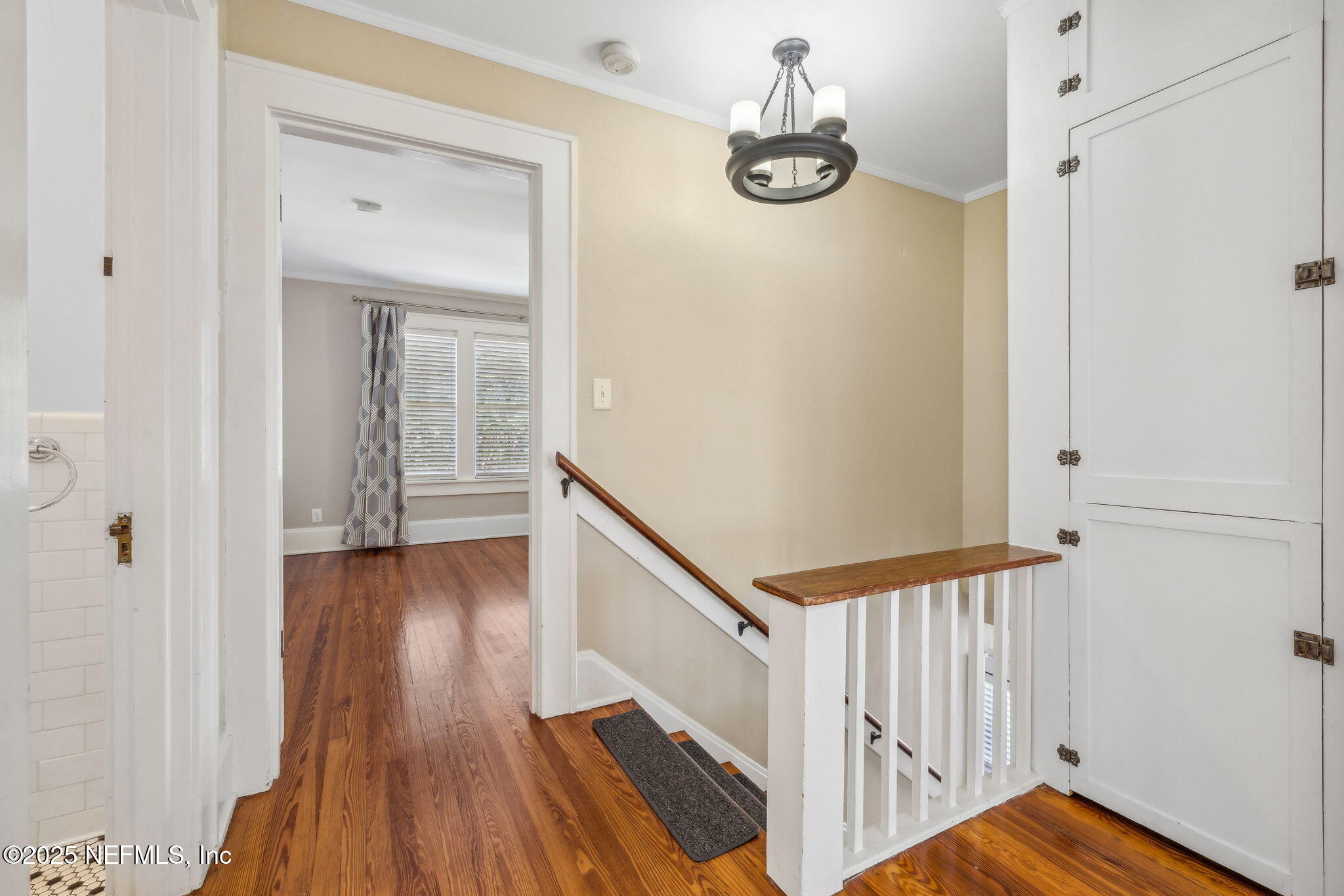 1361 Challen Avenue Jacksonville, FL 32205 - Photo 19 of 45 a view of a hallway with wooden floor and staircase