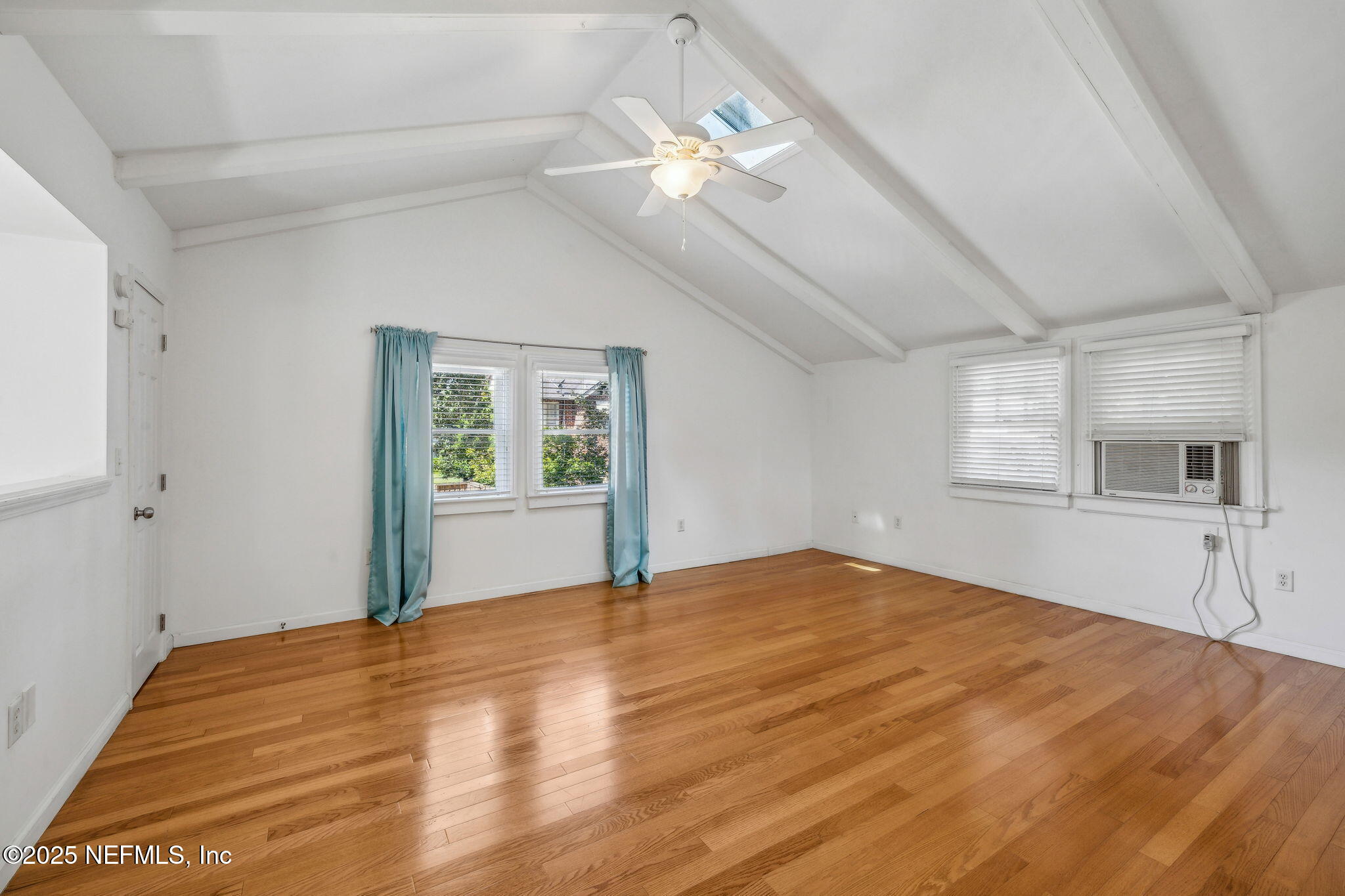 1361 Challen Avenue Jacksonville, FL 32205 - Photo 34 of 45 a view of an empty room with window and wooden floor