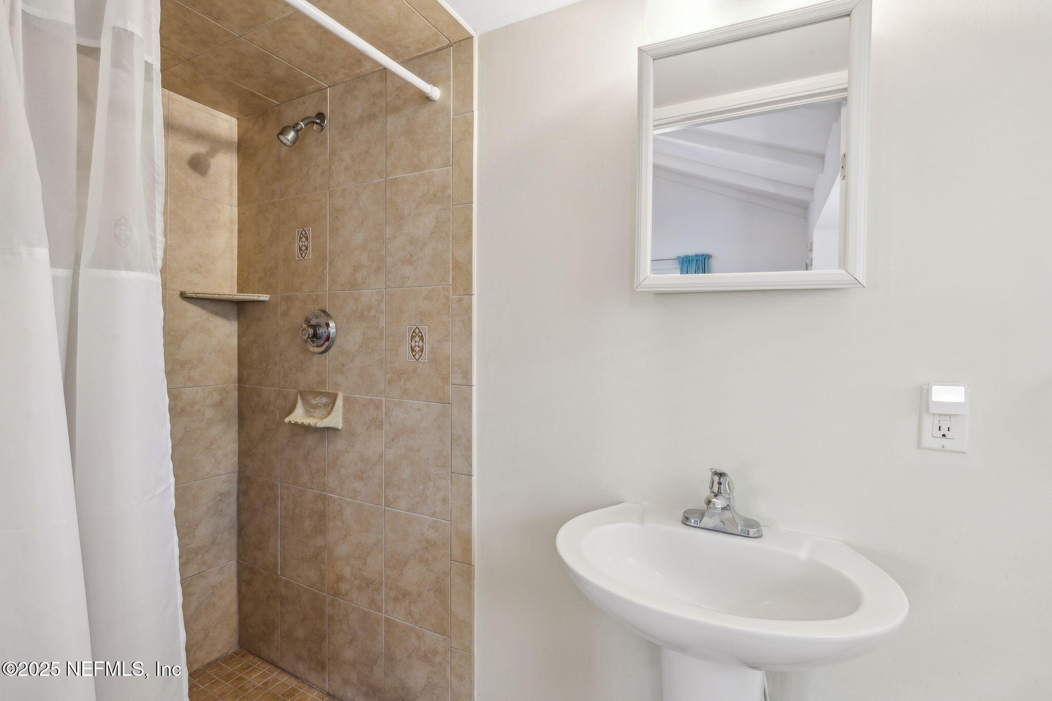 1361 Challen Avenue Jacksonville, FL 32205 - Photo 38 of 45 a bathroom with a sink and a mirror