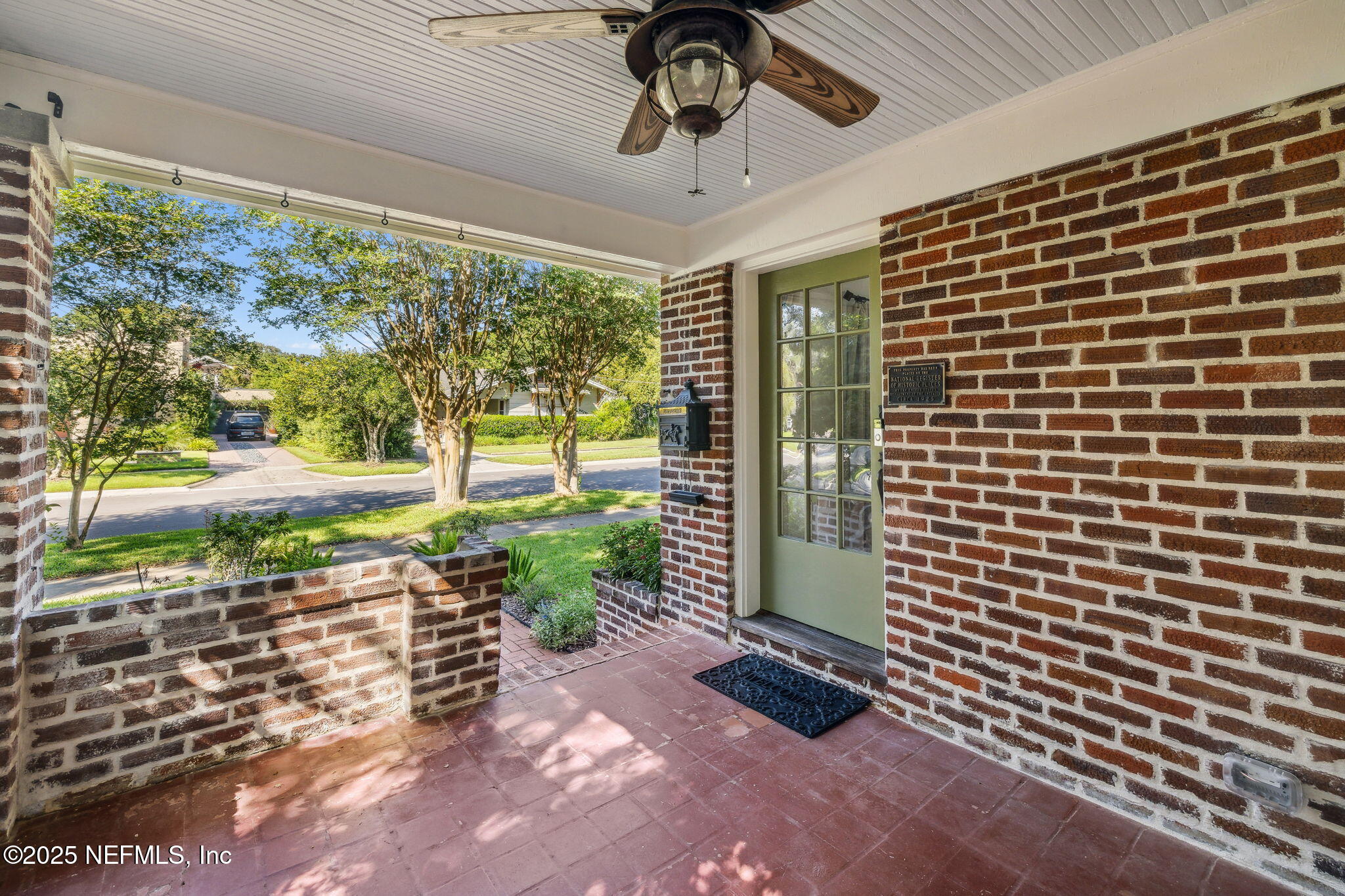 1361 Challen Avenue Jacksonville, FL 32205 - Photo 4 of 45 a view of a porch with a table and chairs