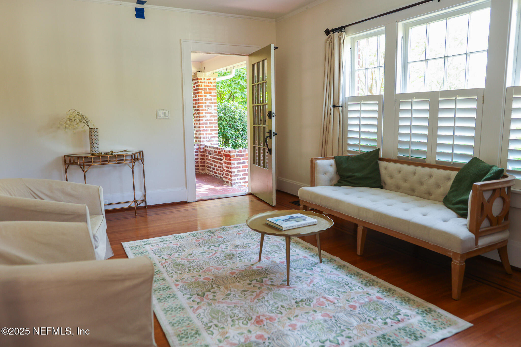 1361 Challen Avenue Jacksonville, FL 32205 - Photo 8 of 45 a living room with furniture and a window