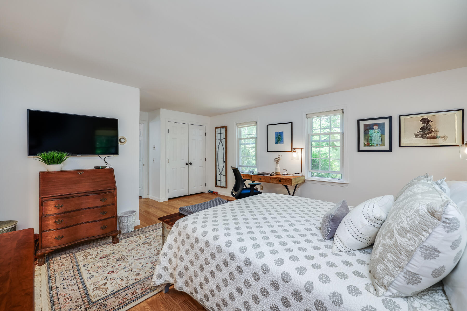 17 Cres Ridge Way Orleans, MA 02653 - Photo 20 of 40 a bedroom with a bed and flat screen tv