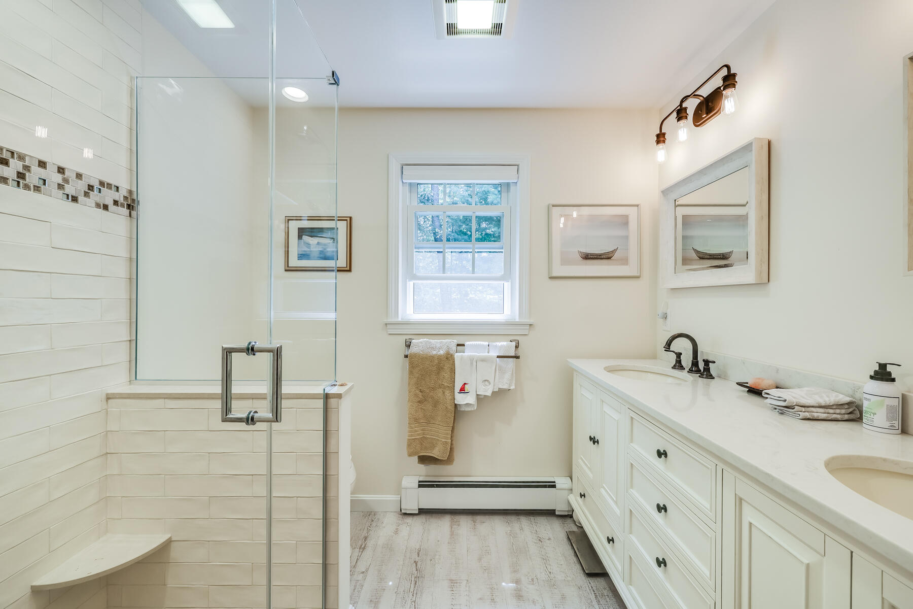 17 Cres Ridge Way Orleans, MA 02653 - Photo 22 of 40 a bathroom with a double vanity sink a mirror and a shower