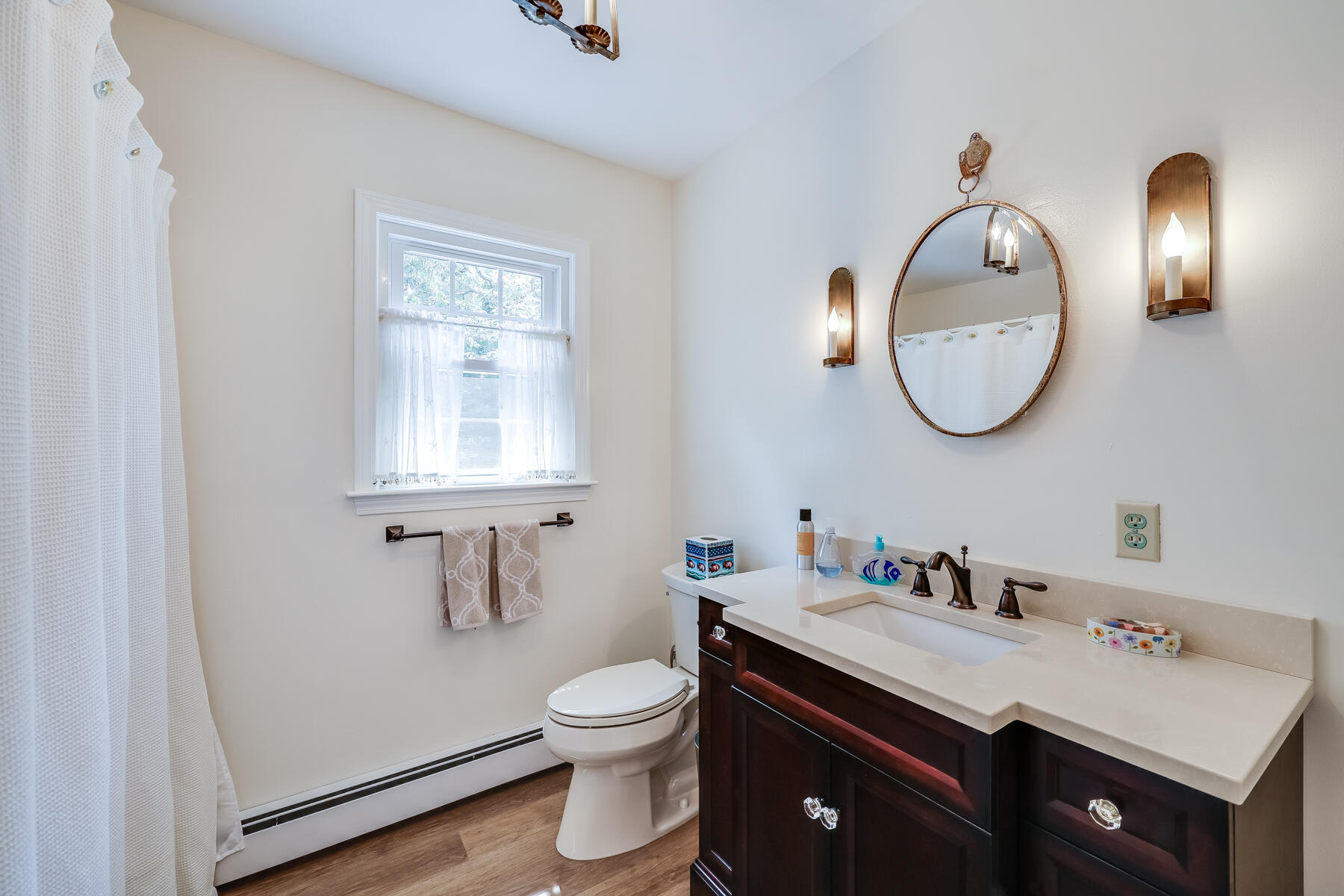17 Cres Ridge Way Orleans, MA 02653 - Photo 26 of 40 a bathroom with a sink and a mirror