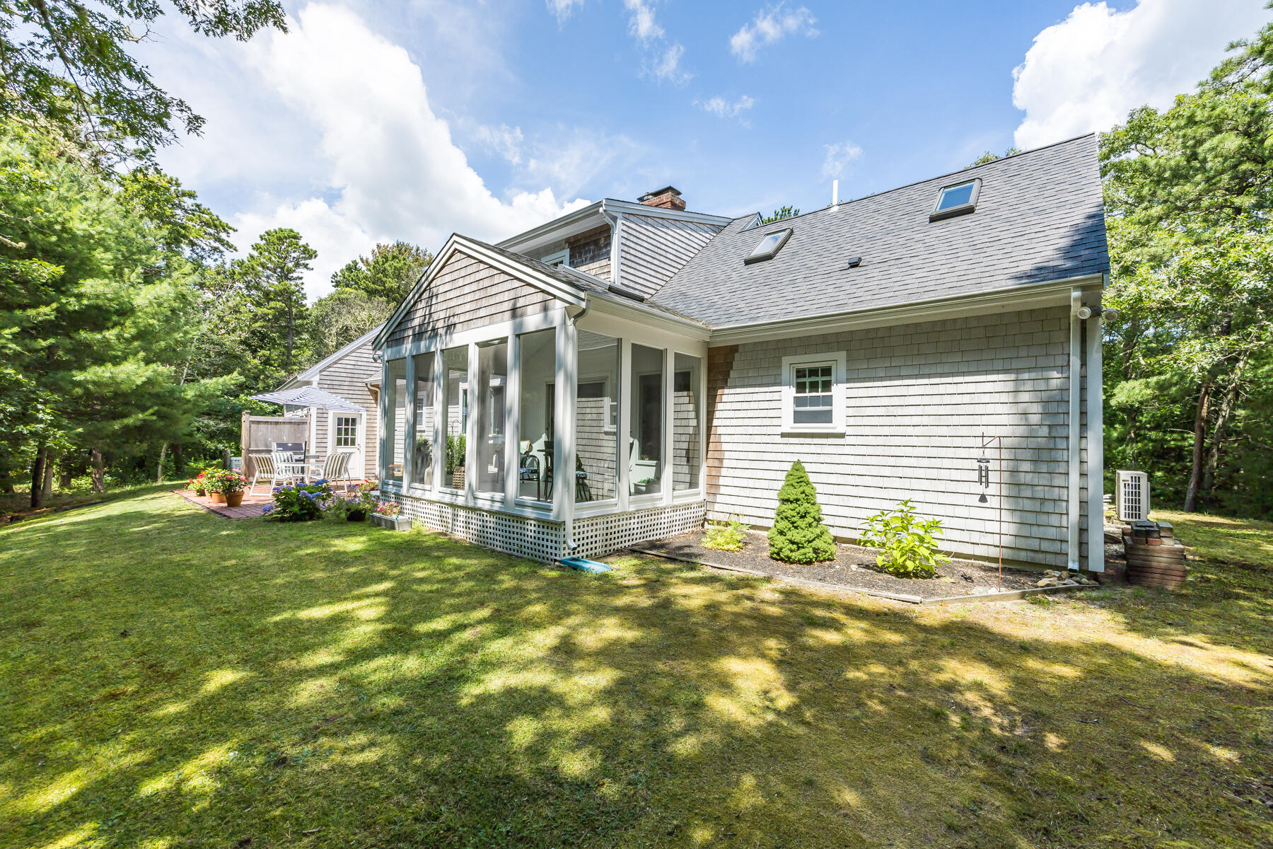 17 Cres Ridge Way Orleans, MA 02653 - Photo 3 of 40 a front view of a house with a garden