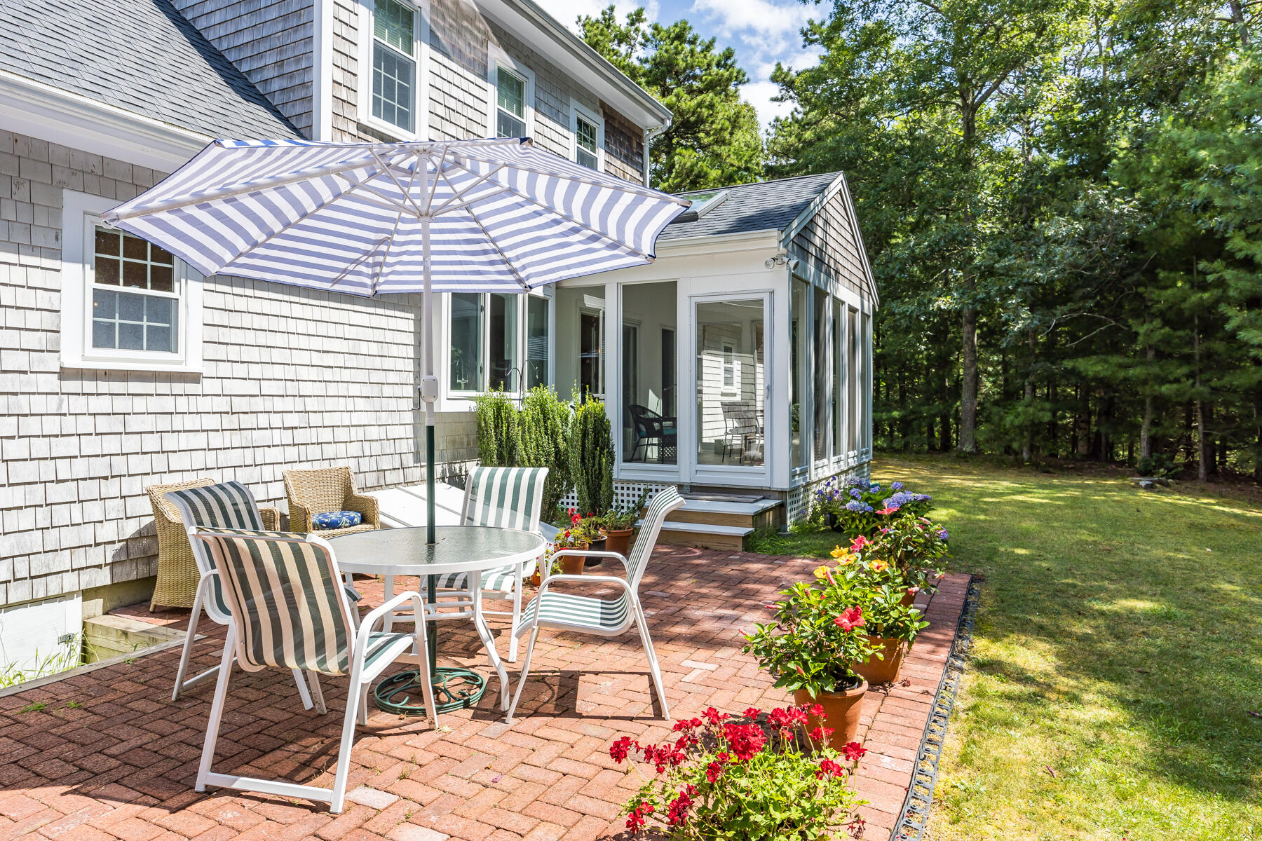 17 Cres Ridge Way Orleans, MA 02653 - Photo 32 of 40 a view of a house with backyard and sitting area