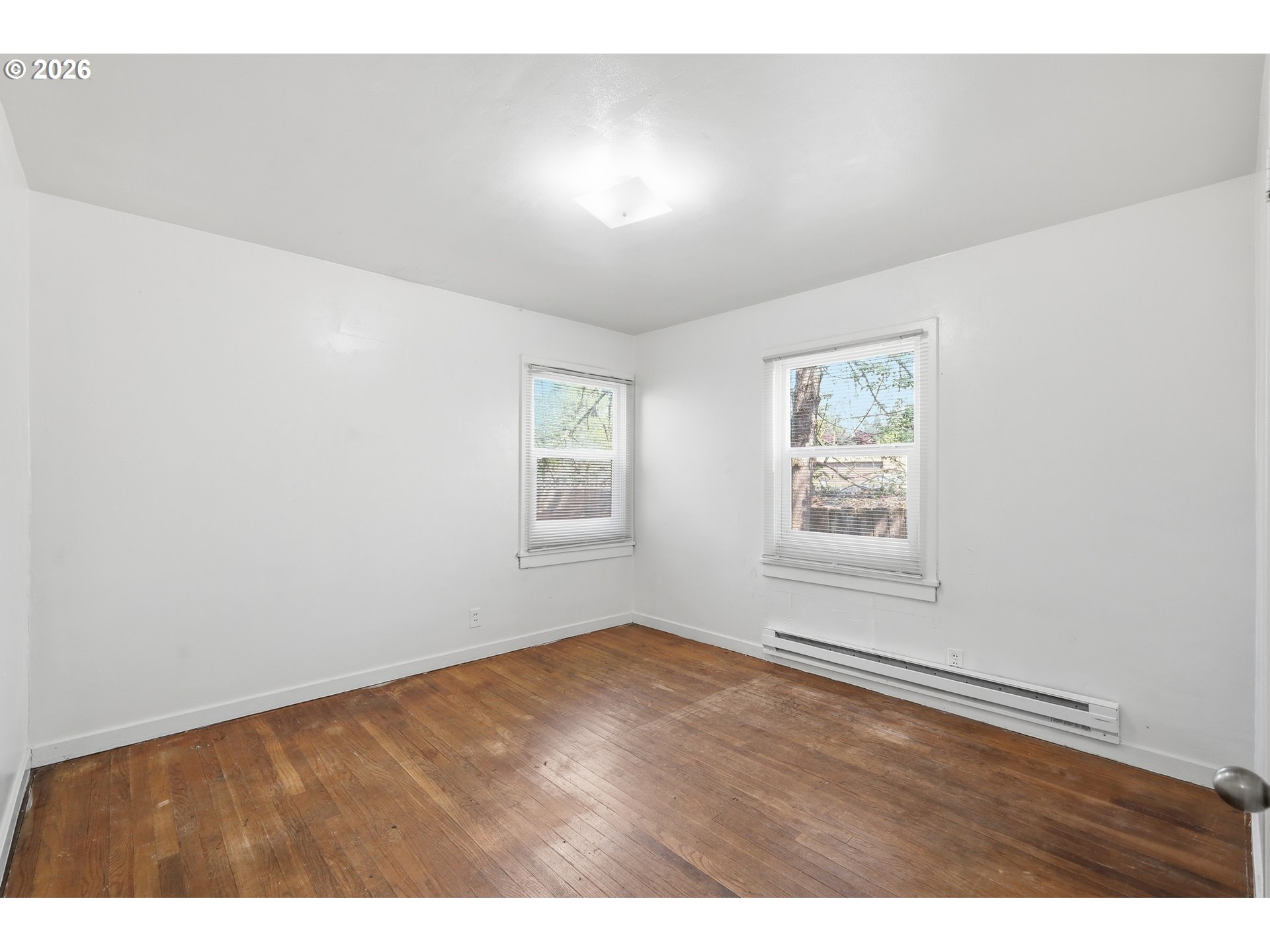 2189 Hilyard Street Eugene, OR 97405 - Photo 18 of 39 a view of an empty room with window