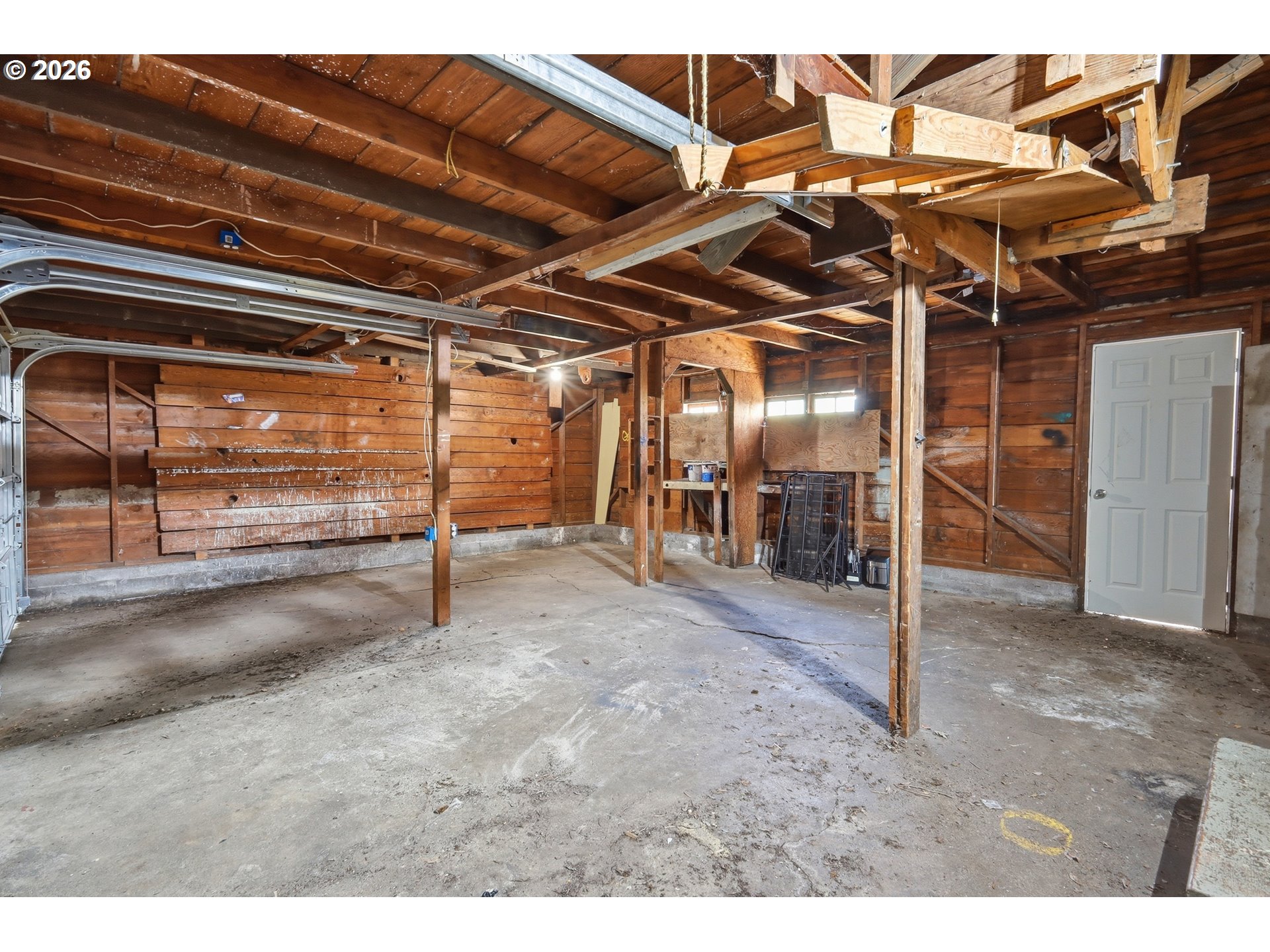 2189 Hilyard Street Eugene, OR 97405 - Photo 30 of 39 a view of empty room with wooden walls