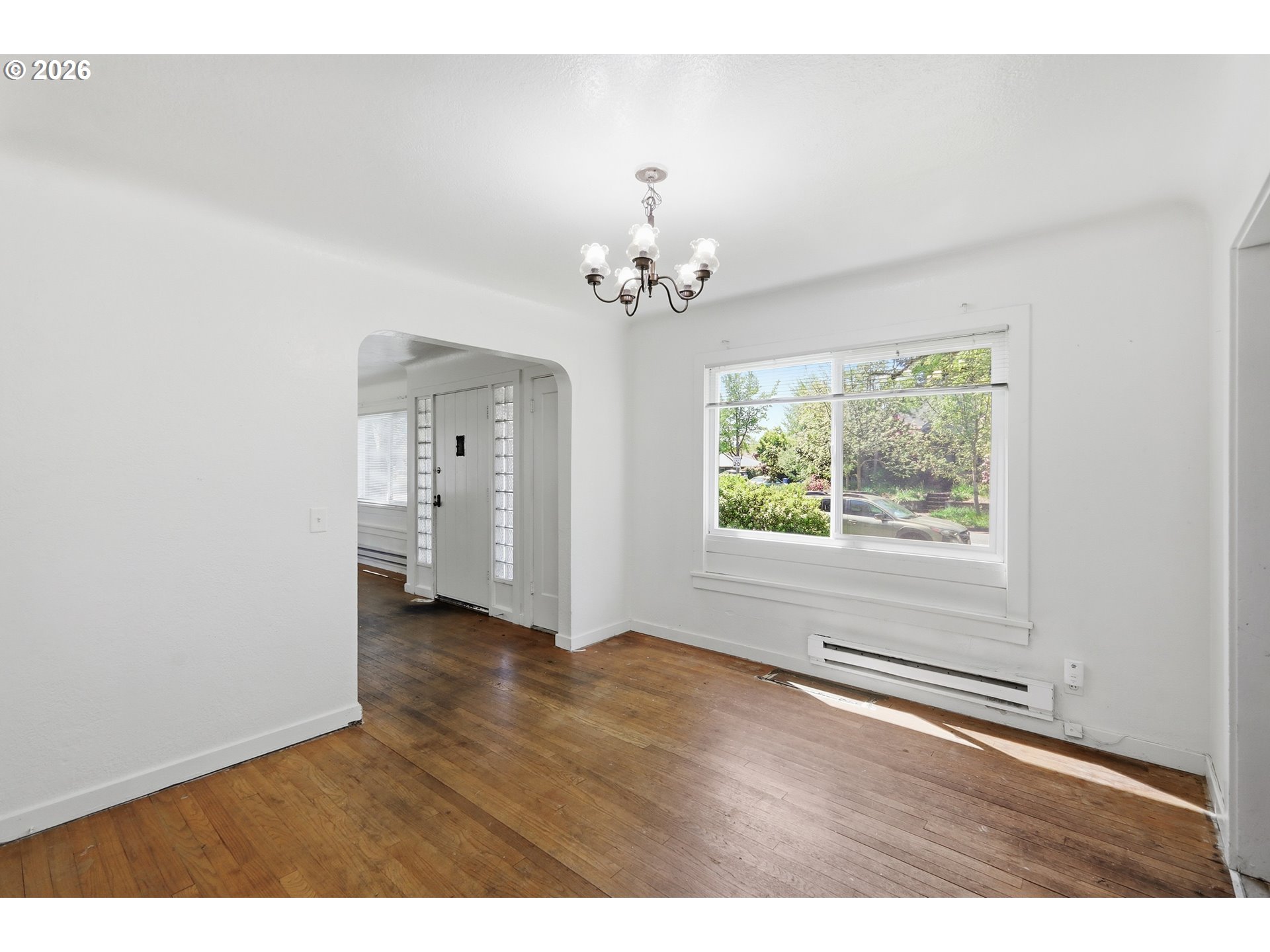 2189 Hilyard Street Eugene, OR 97405 - Photo 7 of 39 a view of an empty room with a window