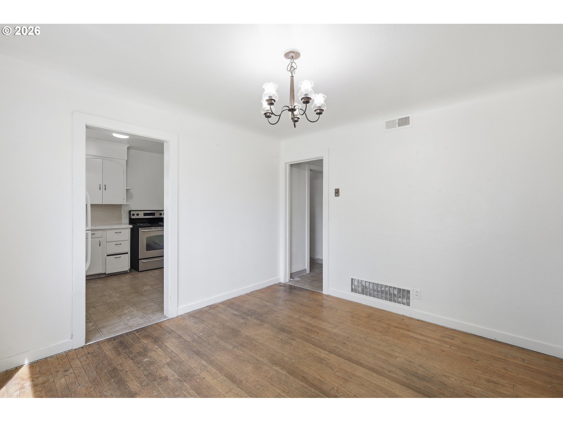2189 Hilyard Street Eugene, OR 97405 - Photo 10 of 39 a view of a kitchen with wooden floor