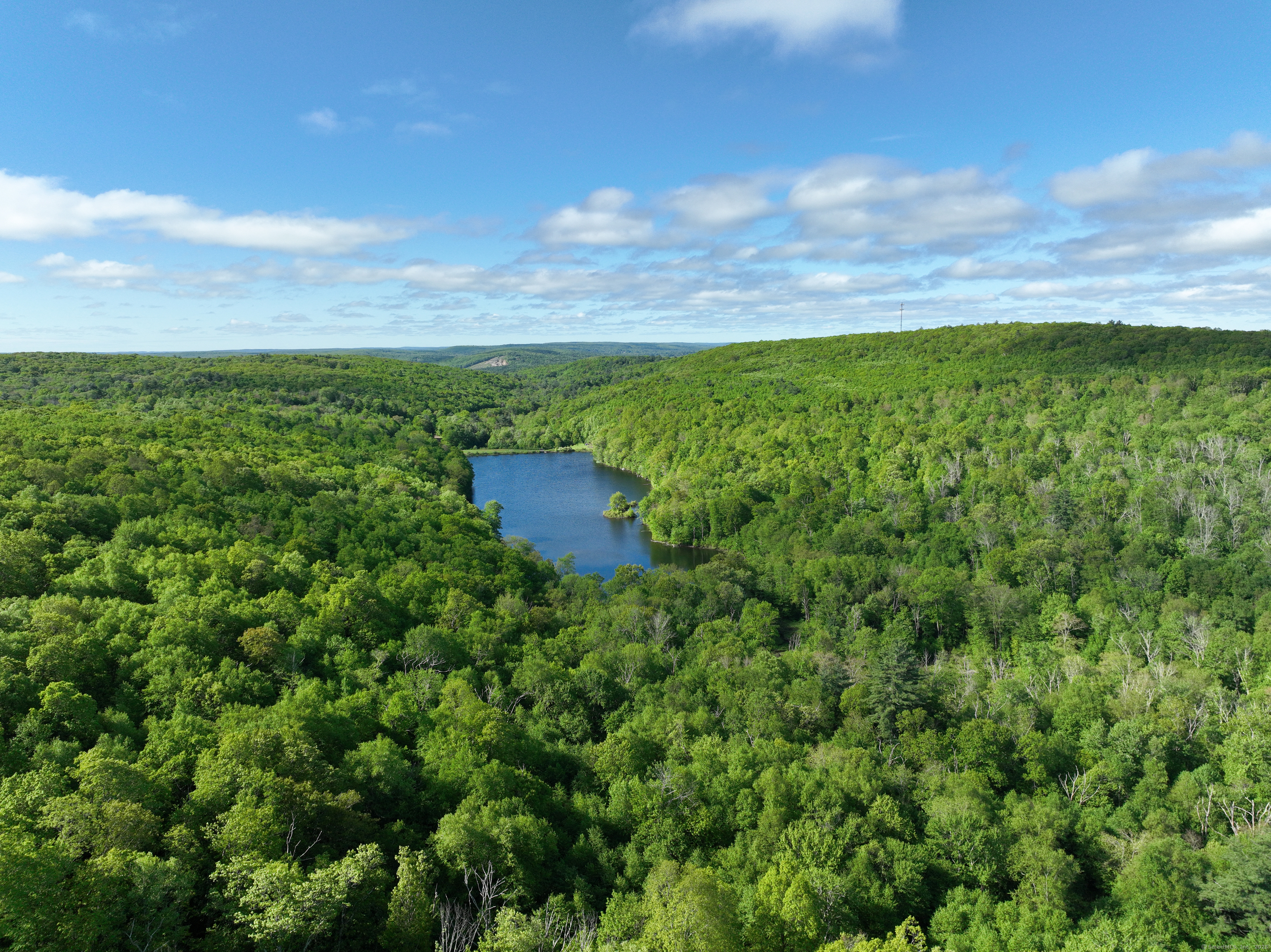 201 Diamond Ledge Road Stafford, CT 06076 - Photo 2 of 25 a view of a field with a tree