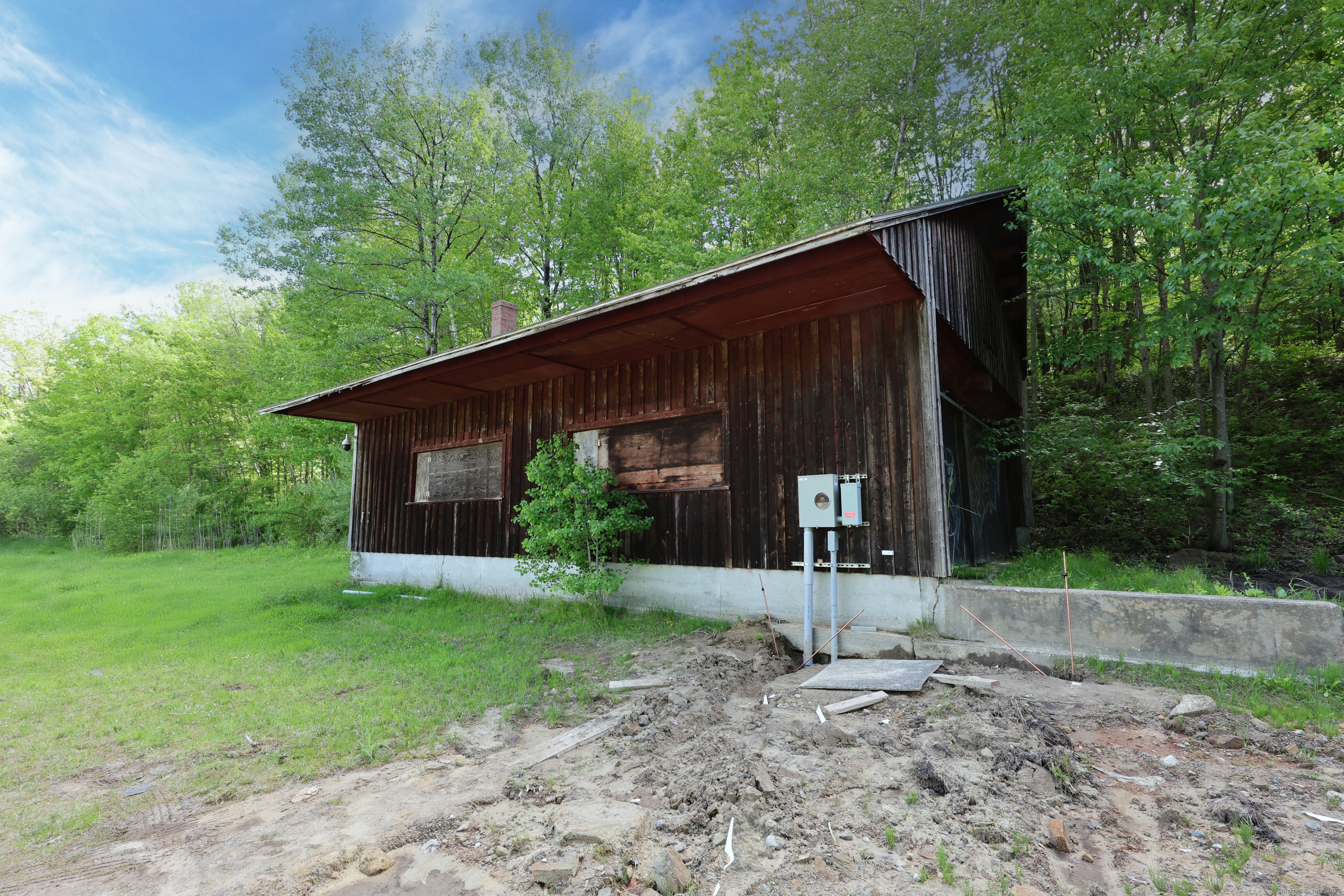 201 Diamond Ledge Road Stafford, CT 06076 - Photo 22 of 25 a backyard of a house with lots of green space