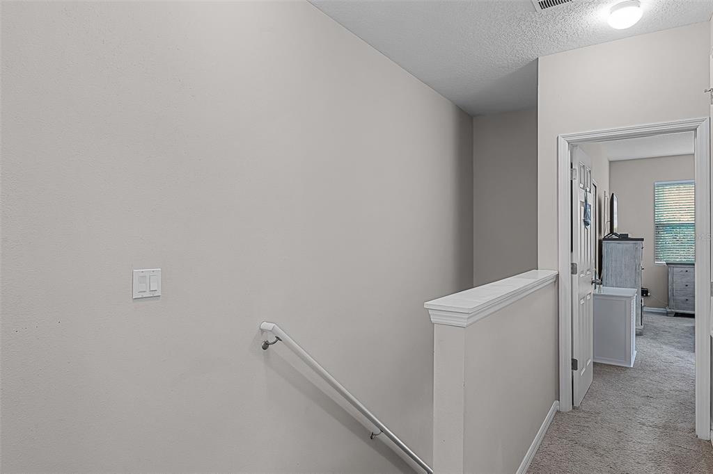 14242 Desert Haven Street, Unit GE Windermere, FL 34786 - Photo 16 of 32 a view of a bathroom with toilet