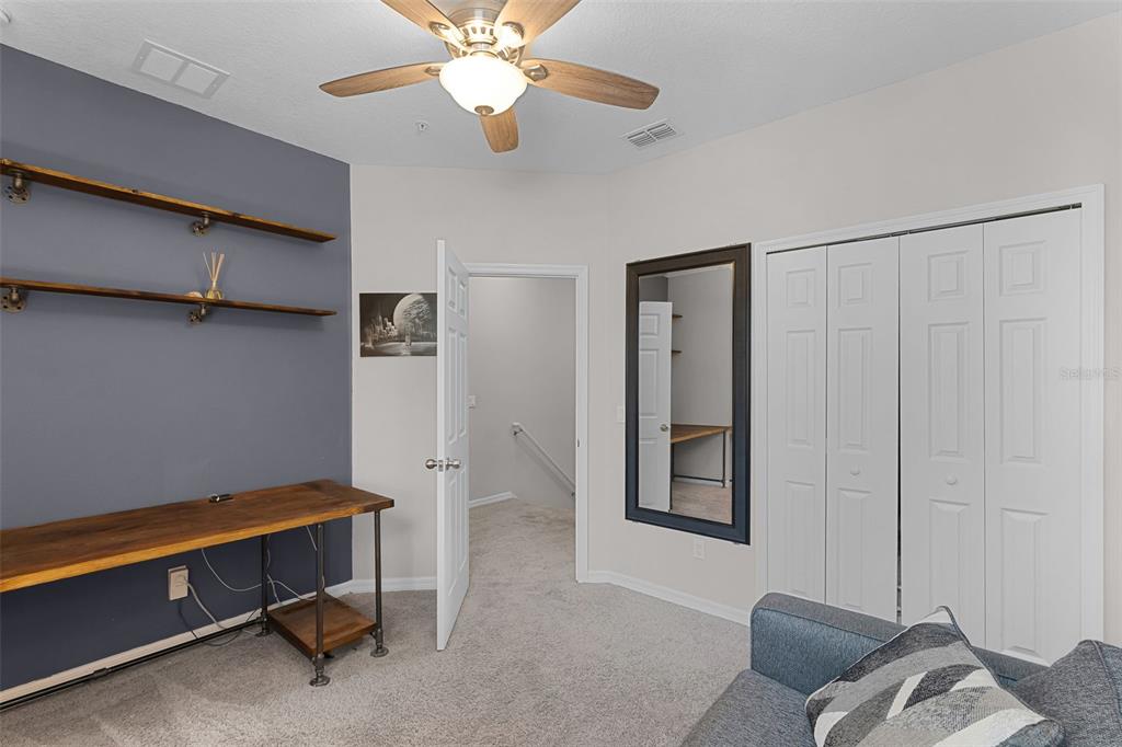 14242 Desert Haven Street, Unit GE Windermere, FL 34786 - Photo 22 of 32 a view of room with workspace and a window