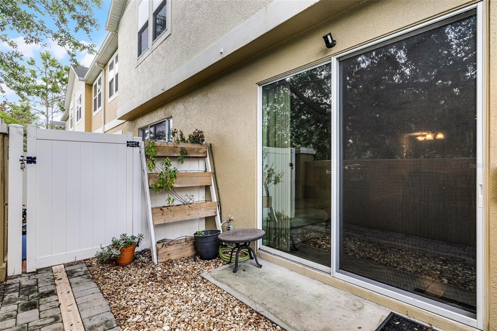 14242 Desert Haven Street, Unit GE Windermere, FL 34786 - Photo 30 of 32 a room with furniture and window