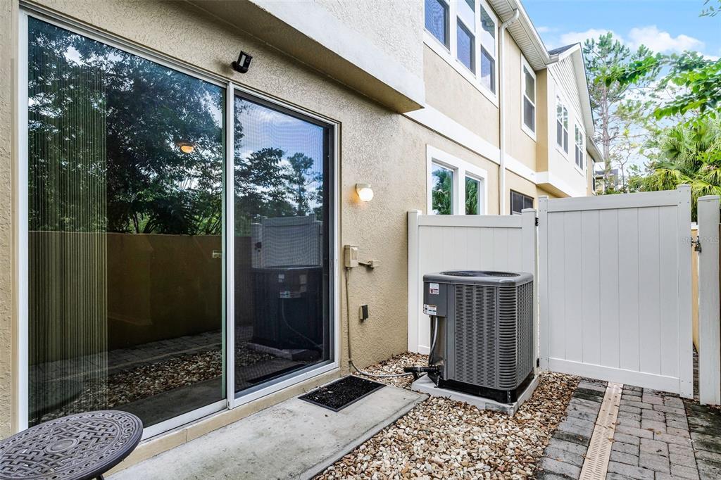 14242 Desert Haven Street, Unit GE Windermere, FL 34786 - Photo 31 of 32 a view of a glass door with glass door