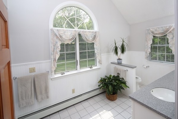 22 Ilex Road Marshfield, MA 02050 - Photo 11 of 21 a view of front door with potted plant