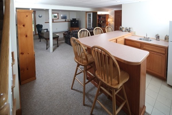 22 Ilex Road Marshfield, MA 02050 - Photo 15 of 21 a view of a dining room with furniture
