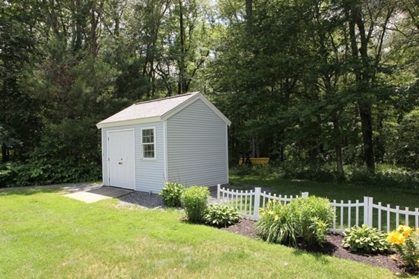 22 Ilex Road Marshfield, MA 02050 - Photo 20 of 21 a front view of a house with a yard