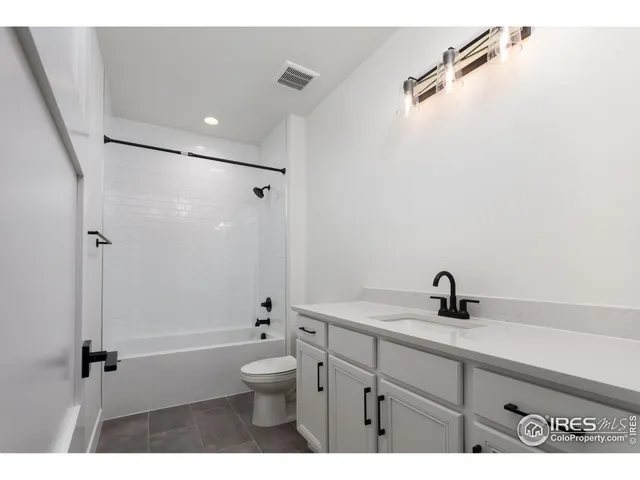 a view interior of house with wooden floor and kitchen view