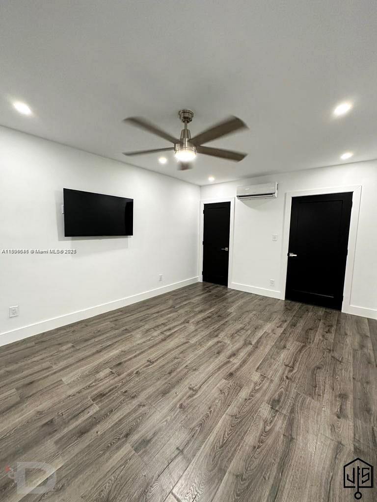 2100 Southwest 100th Avenue, Unit 1 Miami, FL 33165 - Photo 11 of 28 a view of a livingroom with a flat screen tv