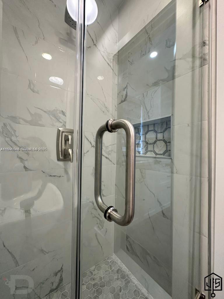 2100 Southwest 100th Avenue, Unit 1 Miami, FL 33165 - Photo 16 of 28 a bathroom with a shower