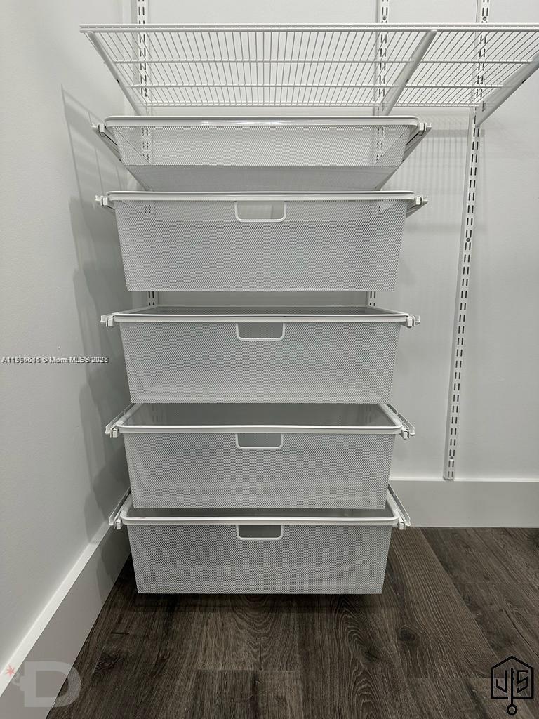 2100 Southwest 100th Avenue, Unit 1 Miami, FL 33165 - Photo 21 of 28 a view of walk in closet with empty racks
