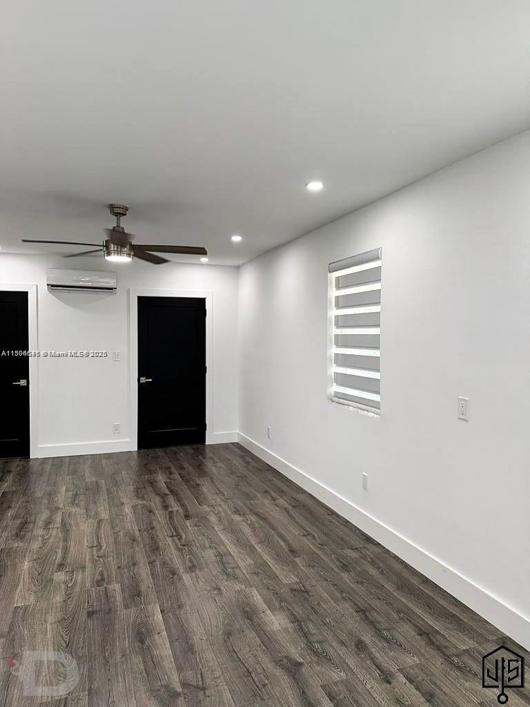 2100 Southwest 100th Avenue, Unit 1 Miami, FL 33165 - Photo 22 of 28 a view of empty room with wooden floor