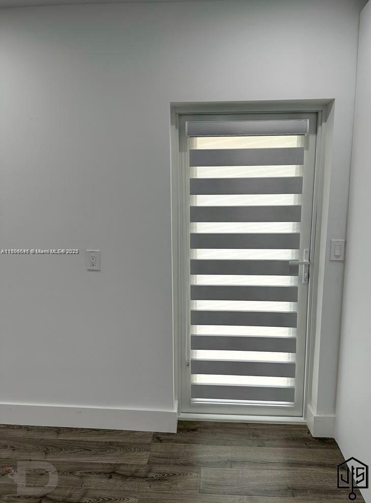 2100 Southwest 100th Avenue, Unit 1 Miami, FL 33165 - Photo 3 of 28 a view of room with stairs and a window