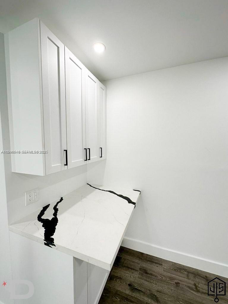 2100 Southwest 100th Avenue, Unit 1 Miami, FL 33165 - Photo 9 of 28 a view of an empty room with wooden floor