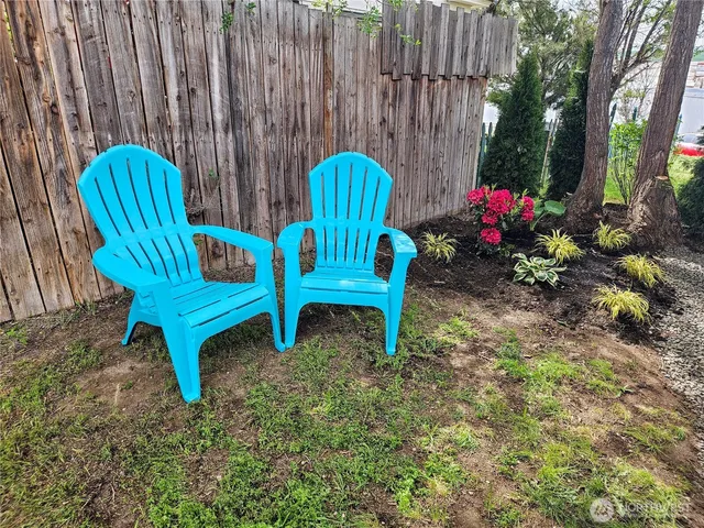 a view of a chairs in patio